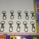 คอหมาโลหะ ดีด ขนาด 1x3.3 cm  บรรจุยกถุงไม่นับใหม่ได้ 970-1000 อัน สีนิเกิ้ล รูป 2